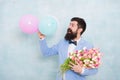 Confidence and charisma. Man bearded gentleman suit bow tie hold air balloons and bouquet. Gentleman making romantic