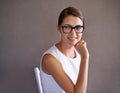 Confidence in her capabilities. Portrait of an attractive young businesswoman wearing glasses. Royalty Free Stock Photo