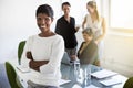 Confidence, leader and portrait of a woman in a business meeting in a modern corporate office. Happy, success and Royalty Free Stock Photo