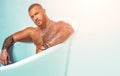 Confidence man. steroids. muscular man with athletic body. sexy abs of tattoo man in bath tub. stay clean and fresh Royalty Free Stock Photo