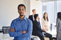 Confident African American business man standing in office looking at camera. Royalty Free Stock Photo