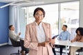 Confident African American business woman manager standing at office meeting. Royalty Free Stock Photo