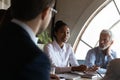 Confident African American businesswoman employee speaking at corporate meeting Royalty Free Stock Photo