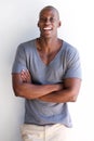 Confident african american man laughing with arms crossed Royalty Free Stock Photo