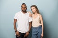 African American man and woman in casual clothes posing together Royalty Free Stock Photo