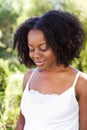 Confident African American woman outside in a garden. Royalty Free Stock Photo