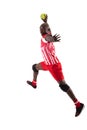 Confident african american young male handball athlete throwing ball against white background Royalty Free Stock Photo