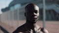 Confident and angry african american man looking at camera - outdoor. Drug trafficker, prisoner or criminal man standing