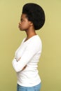 Confident, angry or serious african american woman profile. Black female stand with folded hands Royalty Free Stock Photo