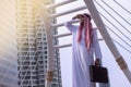 Confident Arabian Businessman standing and looking at city background for vision concept