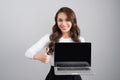 Confident asian business woman showing laptop screen. Royalty Free Stock Photo