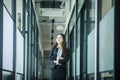 Confident Asian business woman standing with arms crossed Royalty Free Stock Photo