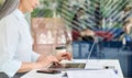 Concentrated mid age businesswoman agent manager working typing using laptop. Royalty Free Stock Photo