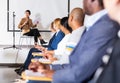 Confident asian woman lecturing during business seminar Royalty Free Stock Photo