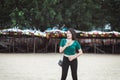 Confident asian woman using mobile phone on the beach,Happy and smiling,Relax time,Summer travel concept Royalty Free Stock Photo