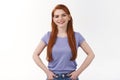 Confident and assertive good-looking redhead queer girl in purple t-shirt, ready take care any proble, standing