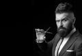 Confident barber at barbershop. Barber and hairdresser salon. Beard care, perfect beard. Bearded man in formal business