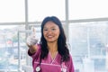 Confident Beautiful Indian Looking Nepali Dentist Doctor Girl Smiling and Giving gestures