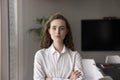 Confident beautiful young businesswoman front headshot portrait