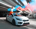 Confident and beautiful young woman in casual sports wear sitting on new car and rejoycing Royalty Free Stock Photo