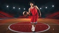 Young African American boy with basketball in the middle of the stadium Royalty Free Stock Photo