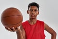 Confident black boy basketball player showing ball Royalty Free Stock Photo