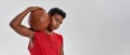 Confident black boy hold ball and look at camera Royalty Free Stock Photo