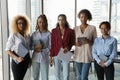 Confident black businesswomen lined up in row for team portrait Royalty Free Stock Photo