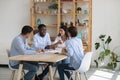 Confident Black project leader interviewing job candidate at meeting table Royalty Free Stock Photo