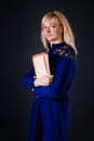 Confident blonde woman with documents in her hands Royalty Free Stock Photo