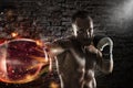 Confident boxer with fiery boxing gloves Royalty Free Stock Photo