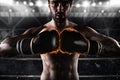 Confident boxer with fiery boxing gloves Royalty Free Stock Photo