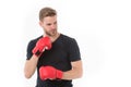 Confident boxer. Sportsman training with boxing gloves. Boxing concept. Man athlete concentrated face with sport gloves