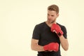 Confident boxer. Sportsman training with boxing gloves. Boxing concept. Man athlete concentrated face with sport gloves