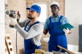 Confident builder posing on indoor construction site Royalty Free Stock Photo