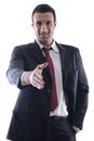 Confident business man giving you a hand shake Royalty Free Stock Photo