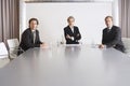 Confident Business People In Conference Room Royalty Free Stock Photo