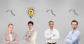 Confident business people with question mark and light bulb signs Royalty Free Stock Photo