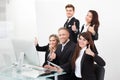 Confident business team showing thumbs up Royalty Free Stock Photo