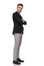 Confident businessman in black suit smiling and waiting in line Royalty Free Stock Photo