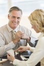 Confident Businessman With Coworker Using Digital Tablet In Office Royalty Free Stock Photo