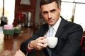 Confident businessman drinking coffee Royalty Free Stock Photo