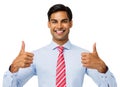 Confident Businessman Gesturing Thumbs Up