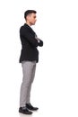 Confident businessman with hands folded waiting in line Royalty Free Stock Photo