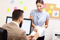 Confident businessman and his assistant in the office Royalty Free Stock Photo