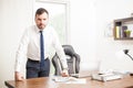 Confident businessman in his office