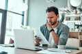 Confident businessman looking at financial documents in cafe Royalty Free Stock Photo