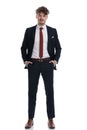 Confident businessman looking forward with both hands in his pockets Royalty Free Stock Photo