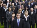 Confident Businessman With Multiethnic Team