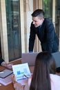 Confident business man presentation in modern conference room for his colleagues. Royalty Free Stock Photo